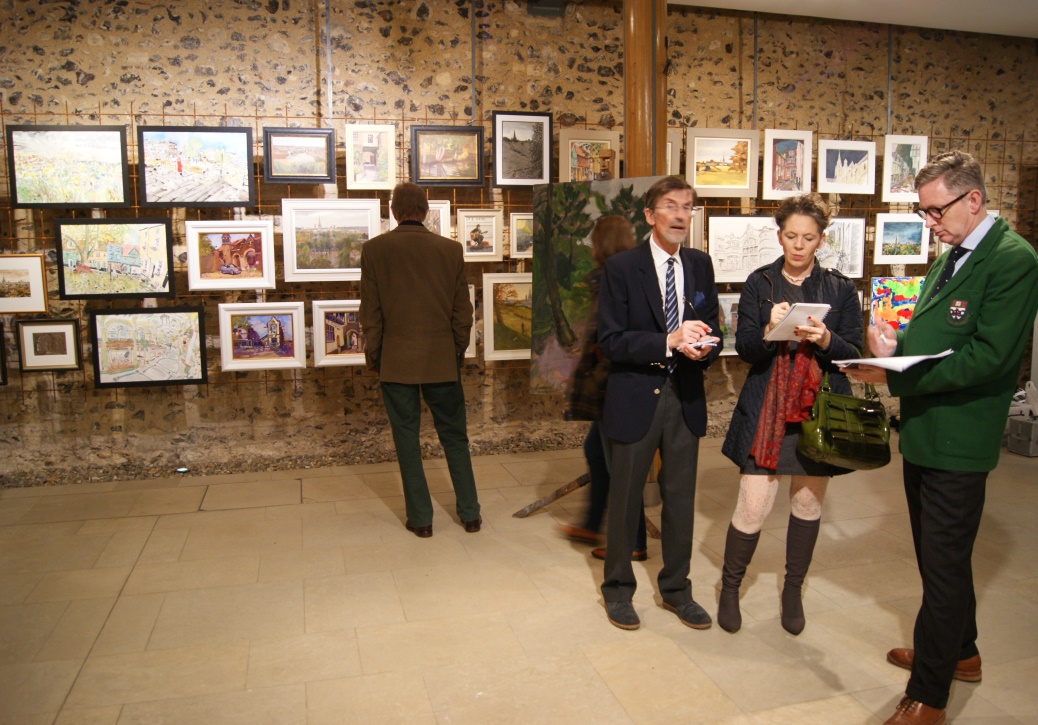 Judges deliberating at the Paint Out Norwich 2015 Exhibition